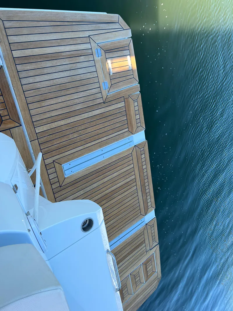 Slide: The Image of 2018 Cruisers Yachts 50 Cantius swim platform with teak decking. - 33