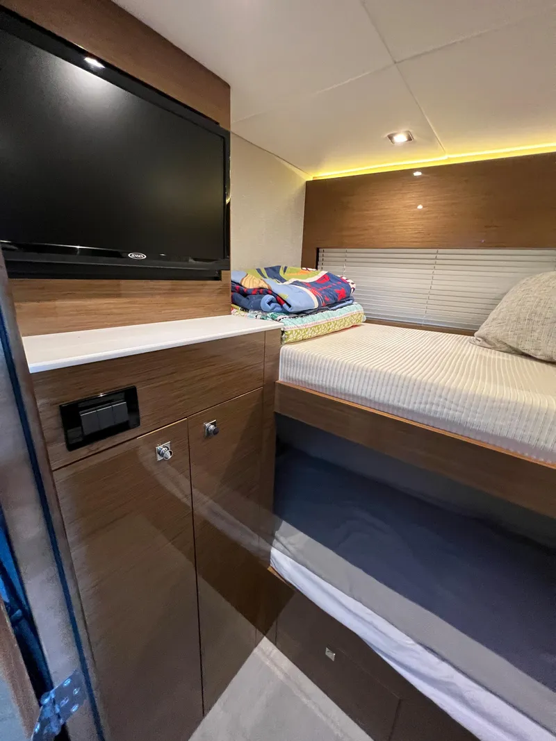 Slide: The Image of 2018 Cruisers Yachts 50 Cantius cabin with bunk beds and TV - 37