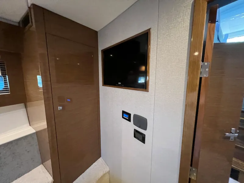 Slide: The Image of Interior of 2018 Cruisers Yachts 50 Cantius with TV and control panel. - 43