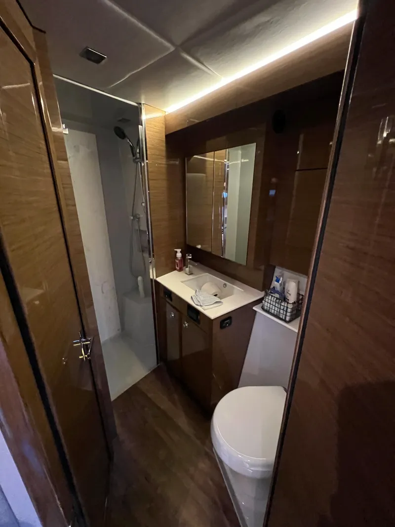 Slide: The Image of 2018 Cruisers Yachts 50 Cantius bathroom with modern fixtures and wooden cabinetry. - 44