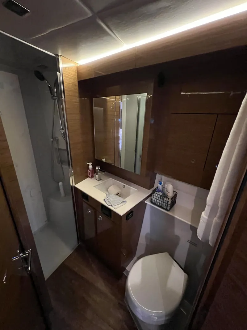 Slide: The Image of 2018 Cruisers Yachts 50 Cantius bathroom with modern fixtures and shower. - 45