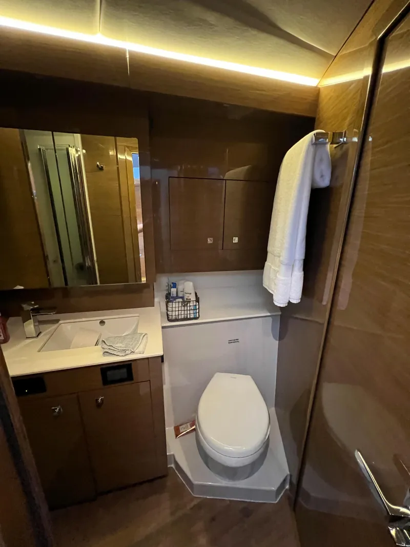Slide: The Image of 2018 Cruisers Yachts 50 Cantius bathroom with modern fixtures and wooden cabinetry. - 47