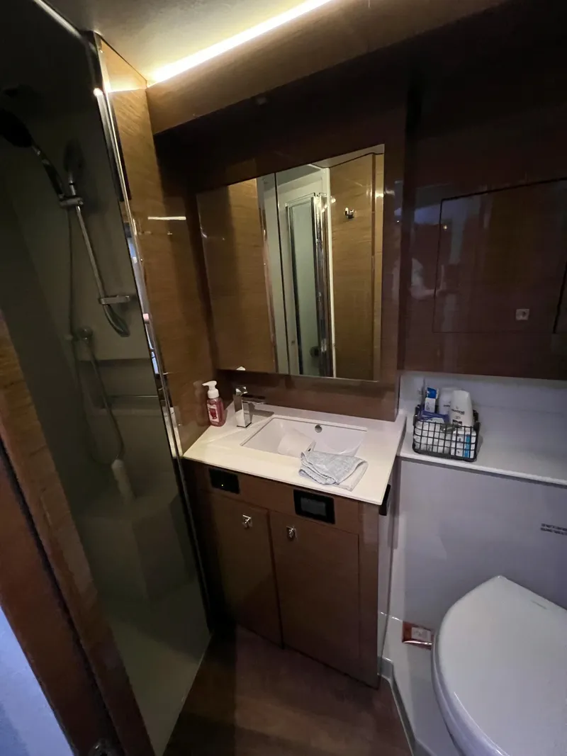 Slide: The Image of 2018 Cruisers Yachts 50 Cantius bathroom with modern fixtures and shower. - 48