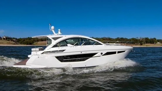 Slide: The Image of 2018 Cruisers Yachts 50 Cantius cruising on open water. - 6