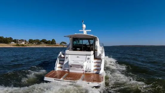 Slide: The Image of 2018 Cruisers Yachts 50 Cantius cruising on open water. - 7