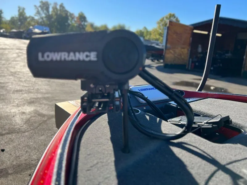 Slide: The Image of Lowrance fishfinder on 2023 Triton 21 TrX Patriot boat, close-up view. - 10