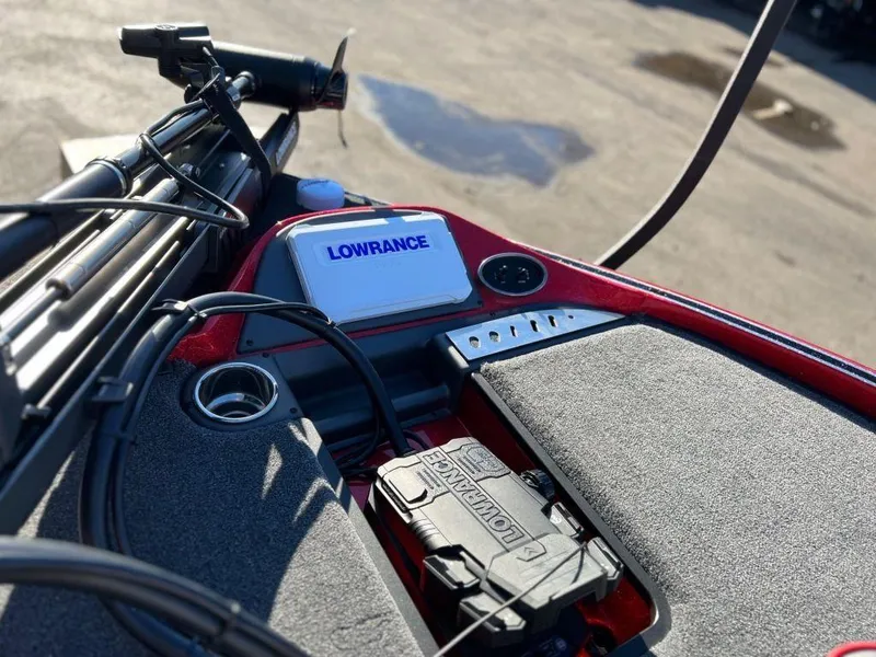 Slide: The Image of 2023 Triton 21 TrX Patriot boat with Lowrance electronics and fishing gear. - 11