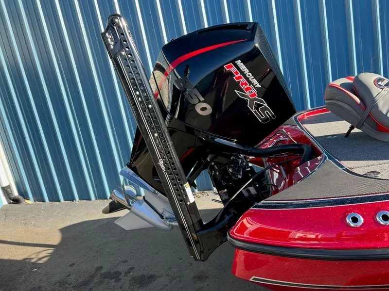 Slide: The Image of 2023 Triton 21 TrX Patriot boat with Mercury Pro XS engine. - 9