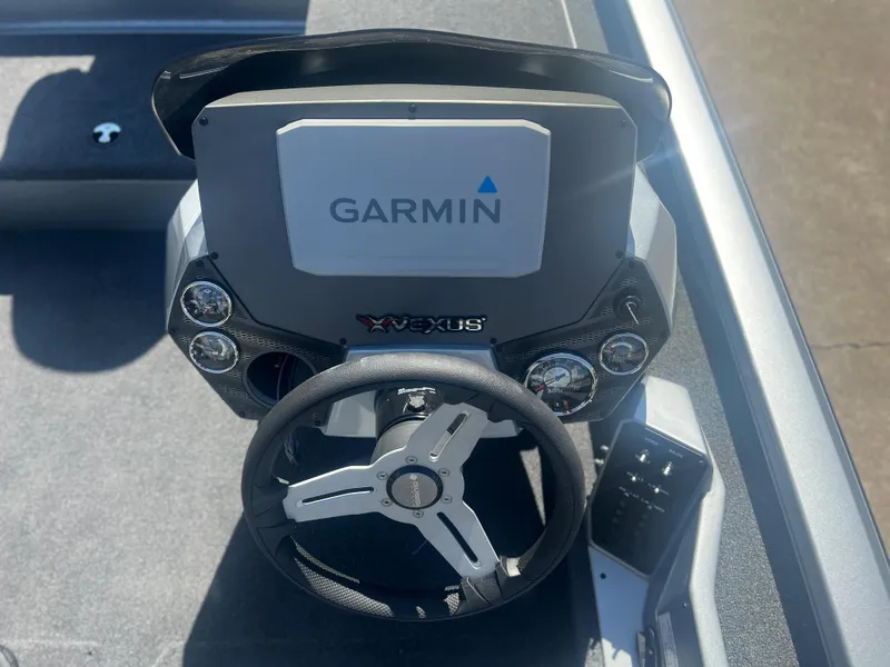 Slide: The Image of 2023 Vexus AVX 189c boat dashboard with Garmin navigation system. - 5
