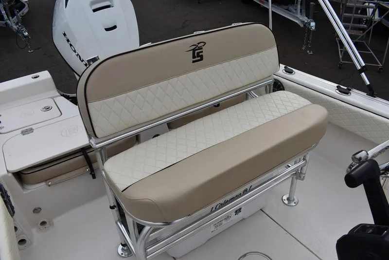 Slide: The Image of 2022 Carolina Skiff 19 Ultra Elite boat seat with beige and white upholstery. - 12