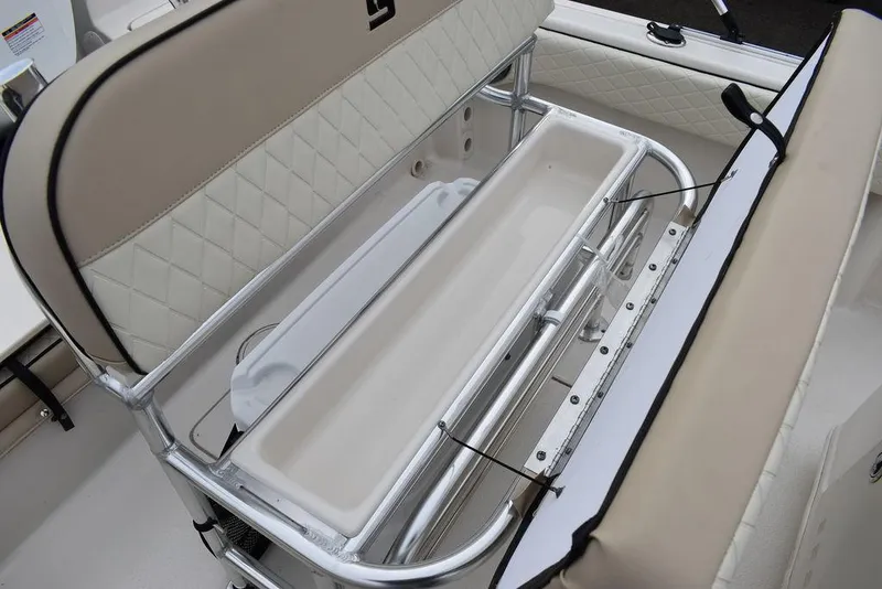 Slide: The Image of 2022 Carolina Skiff 19 Ultra Elite boat seat with storage compartment. - 13