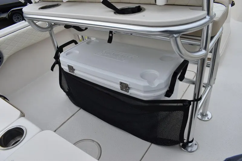 Slide: The Image of 2022 Carolina Skiff 19 Ultra Elite boat with cooler storage under seat. - 20