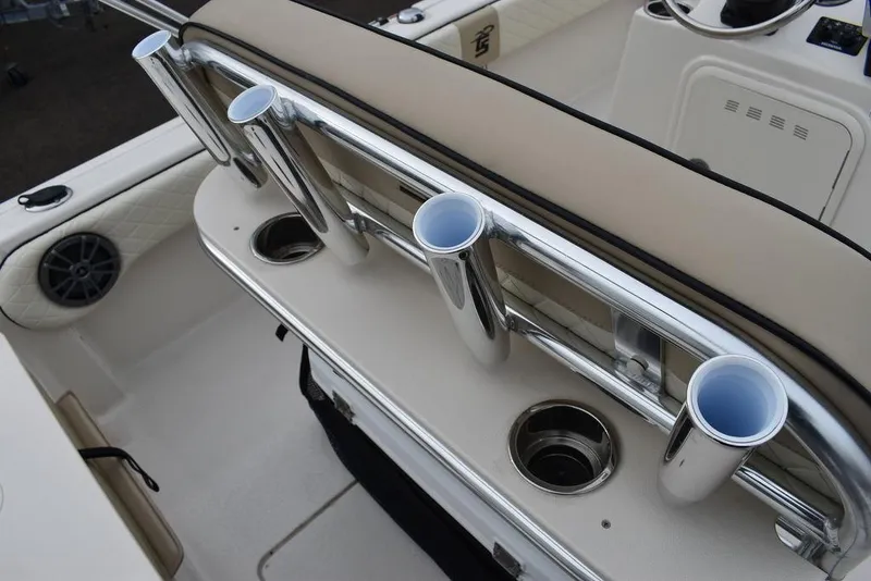 Slide: The Image of 2022 Carolina Skiff 19 Ultra Elite boat with rod holders and cup holders. - 21