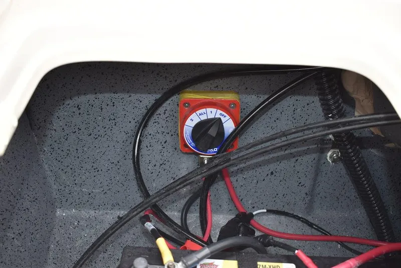 Slide: The Image of 2022 Carolina Skiff 19 Ultra Elite battery switch and wiring compartment. - 28