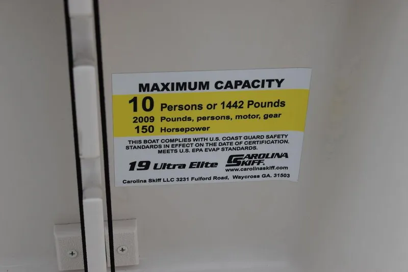 Slide: The Image of Carolina Skiff 19 Ultra Elite 2022 capacity label: 10 persons, 1442 lbs, 150 horsepower. - 29
