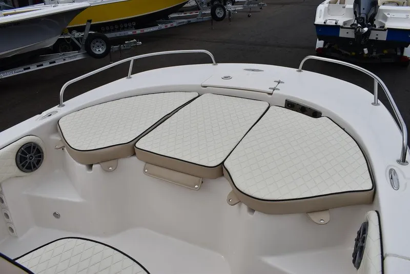 Slide: The Image of 2022 Carolina Skiff 19 Ultra Elite boat with cushioned seating and sleek design. - 33