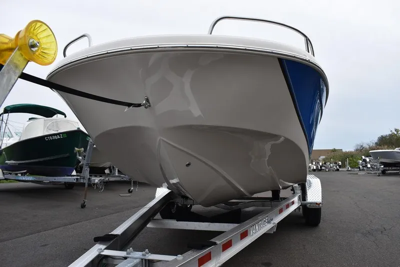 Slide: The Image of 2022 Carolina Skiff 19 Ultra Elite boat on trailer, front view. - 36