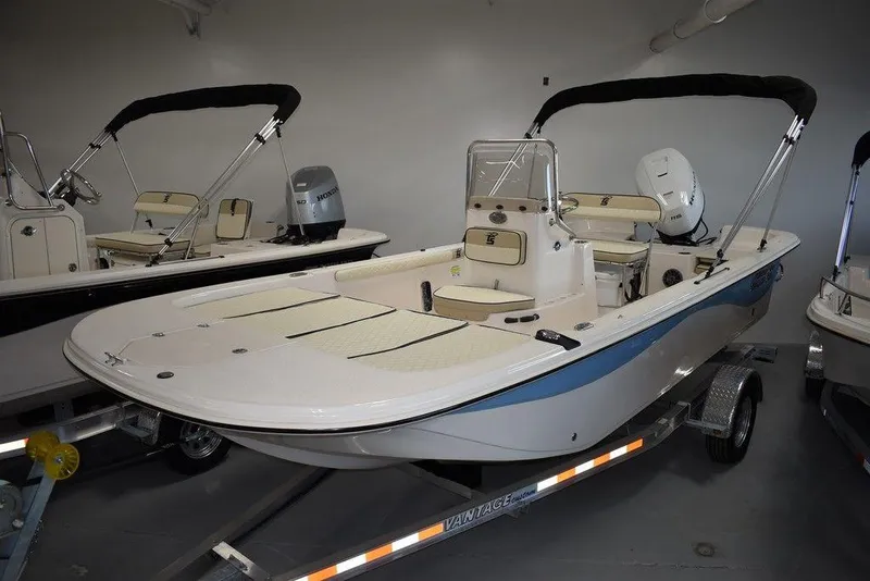 Slide: The Image of 2023 Carolina Skiff 19 LS boat on trailer in showroom. - 1
