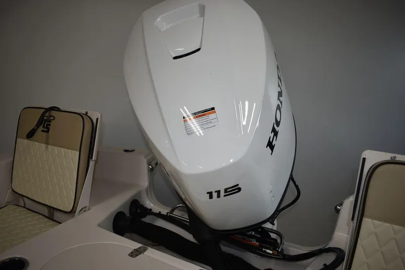 Slide: The Image of 2023 Carolina Skiff 19 LS boat with Honda 115 outboard motor. - 16