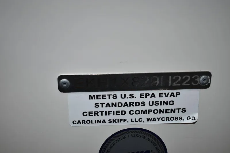 Slide: The Image of 2023 Carolina Skiff 19 LS compliance label, meets U.S. EPA EVAP standards, certified components. - 24