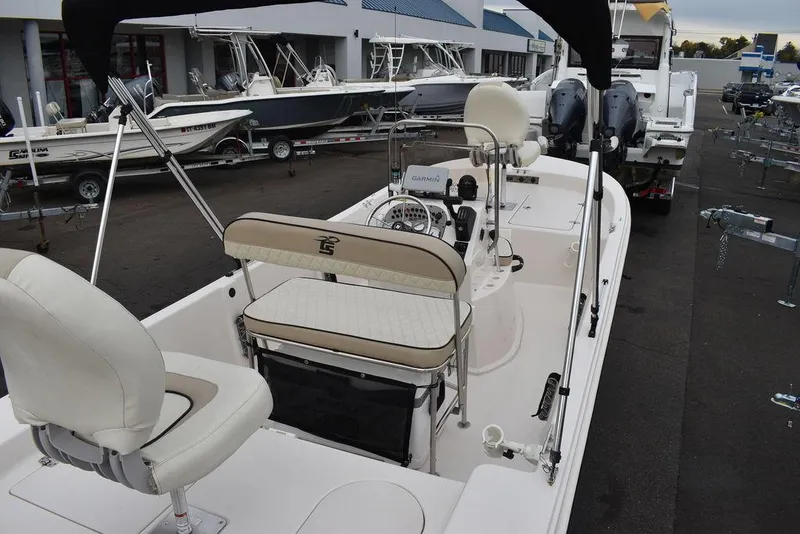 Slide: The Image of 2023 Carolina Skiff 178 JLS boat interior with seating and console. - 11