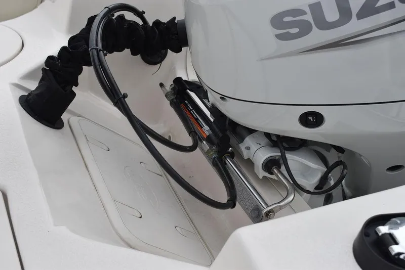 Slide: The Image of 2023 Carolina Skiff 178 JLS boat with Suzuki outboard motor. - 19