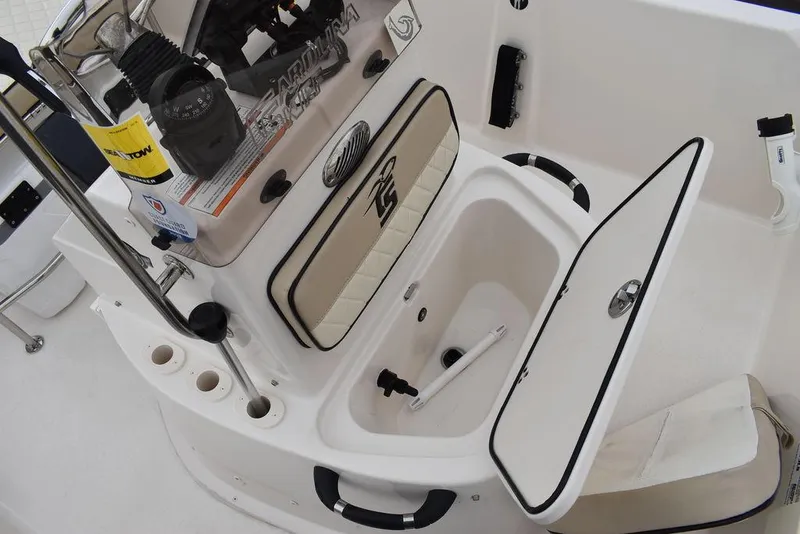 Slide: The Image of 2023 Carolina Skiff 178 JLS boat interior with open storage compartments. - 36