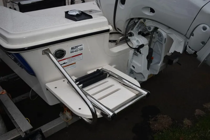Slide: The Image of 2023 Carolina Skiff 192 JLS boat with stainless steel swim ladder. - 11