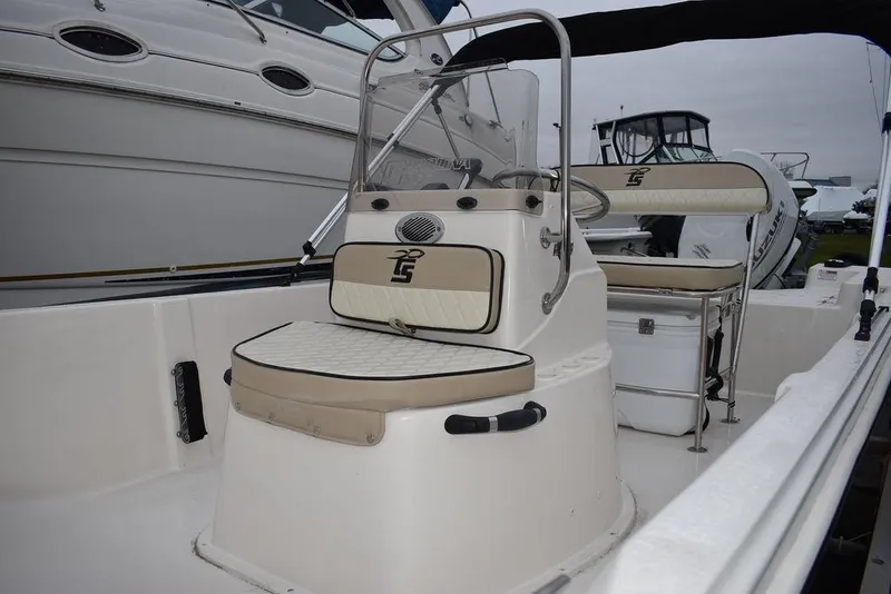Slide: The Image of 2023 Carolina Skiff 192 JLS boat interior with seating and console. - 7