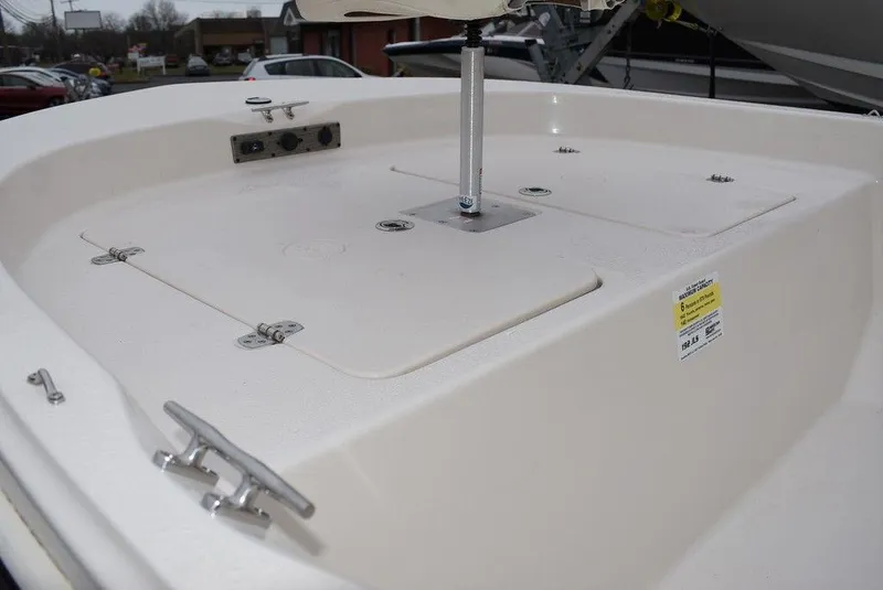 Slide: The Image of 2023 Carolina Skiff 192 JLS boat deck with storage compartments and cleats. - 8