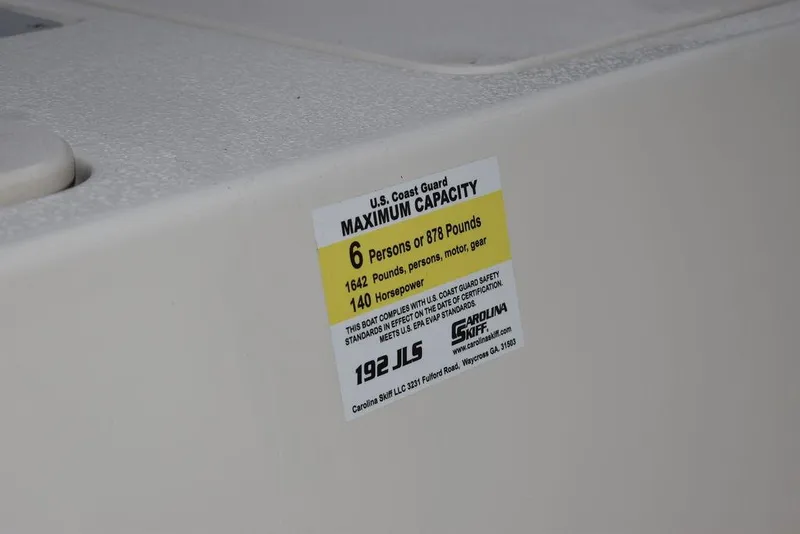 Slide: The Image of 2023 Carolina Skiff 192 JLS capacity label, 6 persons or 878 pounds. - 9