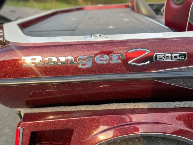 Slide: The Image of 2020 Ranger Z520C boat, maroon finish, close-up of logo and model details. - 3