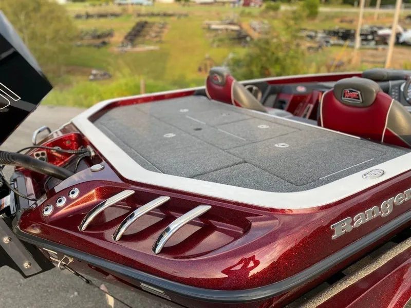 Slide: The Image of 2020 Ranger Z520C boat with sleek red finish and spacious deck. - 4