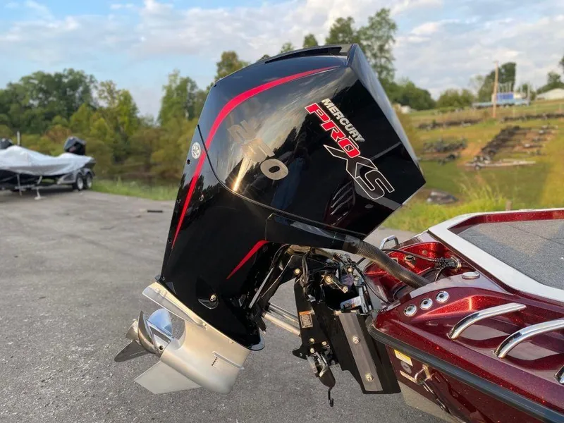 Slide: The Image of 2020 Ranger Z520C boat with Mercury Pro XS outboard motor in scenic outdoor setting. - 6