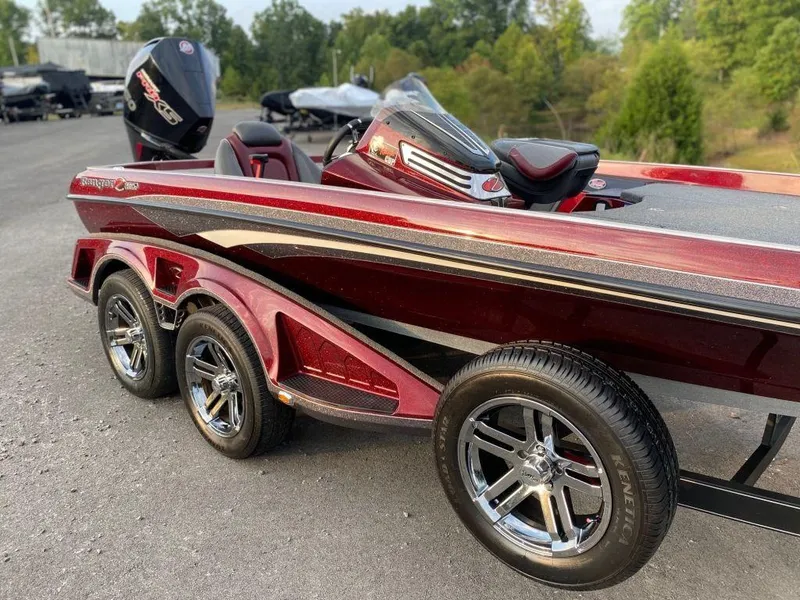 Slide: The Image of 2020 Ranger Z520C Ranger Cup boat with sleek design and triple-axle trailer. - 9