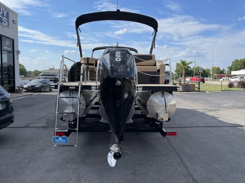 Slide: The Image of 2023 Barletta Cabrio 24 UE pontoon boat rear view with outboard motor. - 16