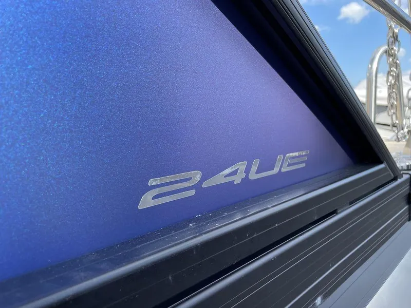 Slide: The Image of 2023 Barletta Cabrio 24 UE boat close-up with model name. - 21