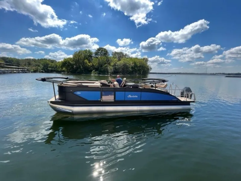 Slide: The Image of 2023 Barletta Cabrio 24 UE pontoon boat on a sunny lake. - 40