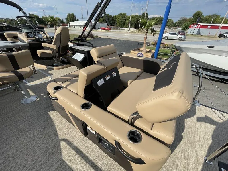 Slide: The Image of 2023 Barletta Cabrio 24 UE pontoon boat with beige seating and modern design. - 42
