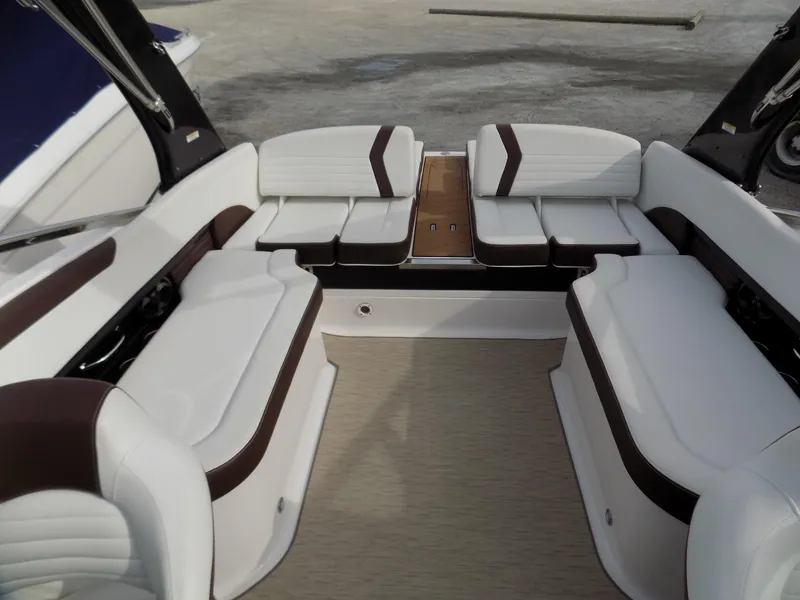Slide: The Image of 2017 Regal 2500 boat interior with white and brown seating arrangement. - 9