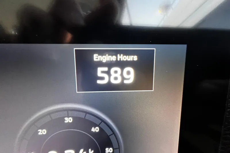Slide: The Image of Ranger Tugs R-29S 2021 engine display showing 589 engine hours. - 20