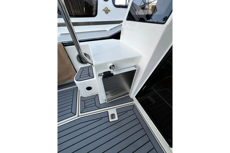 Slide: The Image of 2021 Ranger Tugs R-29S interior with sleek design and modern finishes. - 4