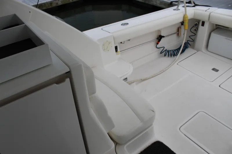 Slide: The Image of 2002 Tiara Yachts 3800 Open boat deck with seating and storage compartments. - 22