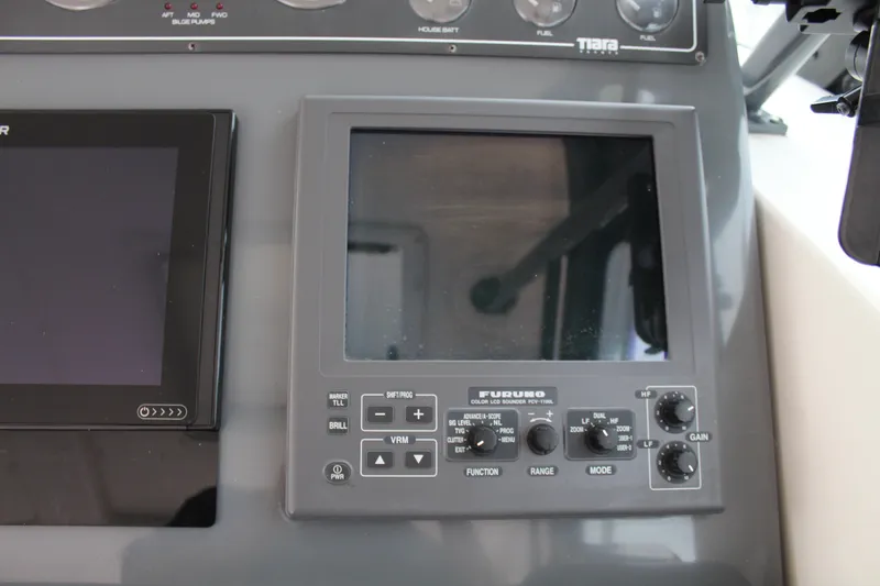 Slide: The Image of Furuno navigation system on a 2002 Tiara Yachts 3800 Open dashboard. - 28