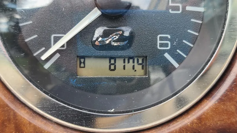 Slide: The Image of Close-up of 2002 Sea Ray 225 Weekender boat hour meter showing 817.4 hours. - 20