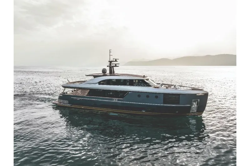 Slide: The Image of 2023 Azimut Magellano 30M yacht cruising on open water. - 0