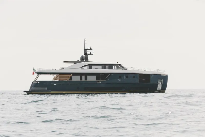 Slide: The Image of 2023 Azimut Magellano 30M yacht cruising on open water. - 1