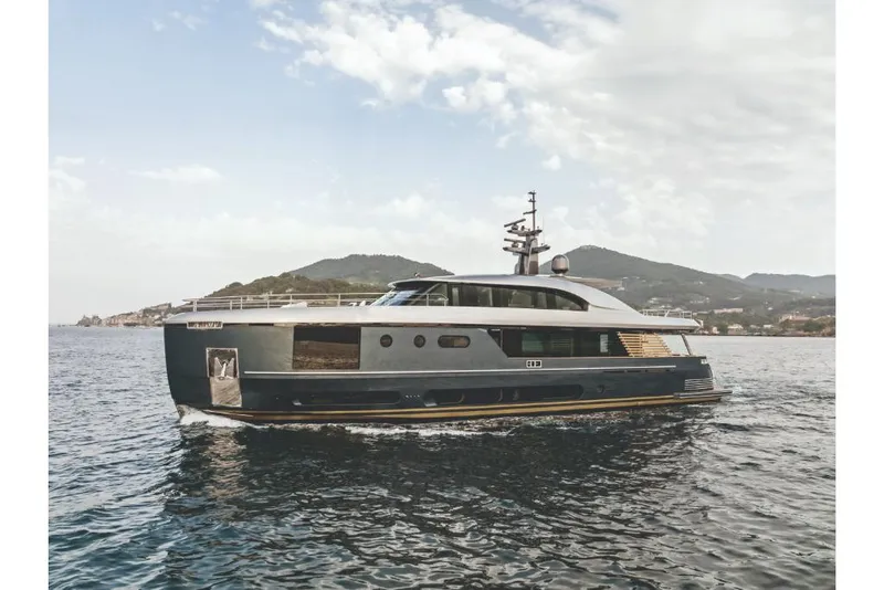 Slide: The Image of 2023 Azimut Magellano 30M luxury yacht cruising on the water. - 10