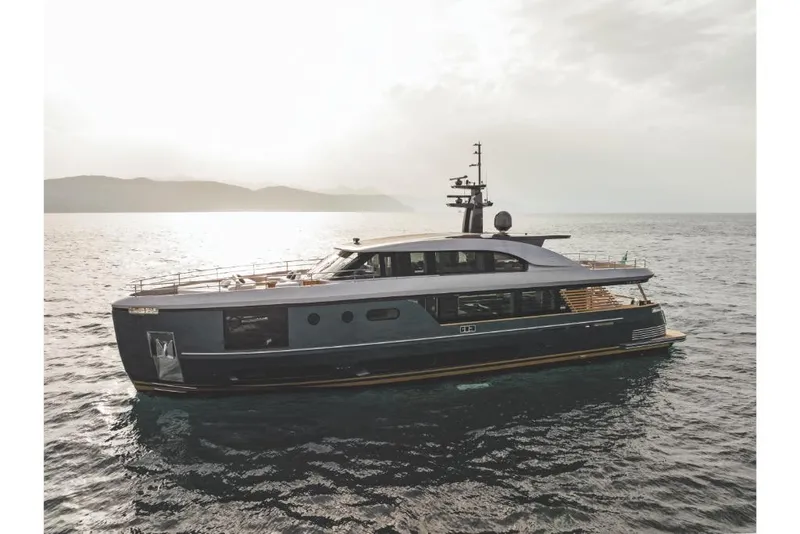 Slide: The Image of 2023 Azimut Magellano 30M luxury yacht cruising on open water. - 18