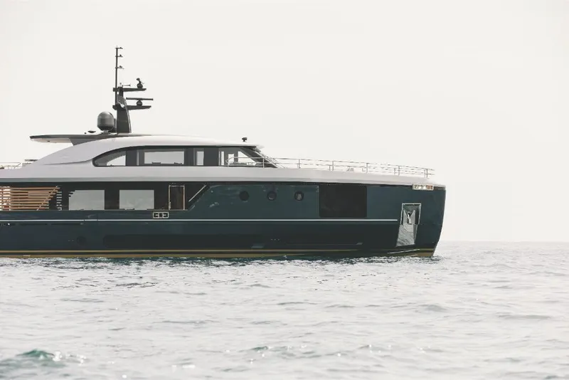 Slide: The Image of 2023 Azimut Magellano 30M yacht cruising on open water. - 2
